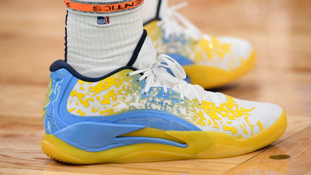 New Orleans Pelicans forward Zion Williamson's yellow and blue Jordan Brand sneakers.